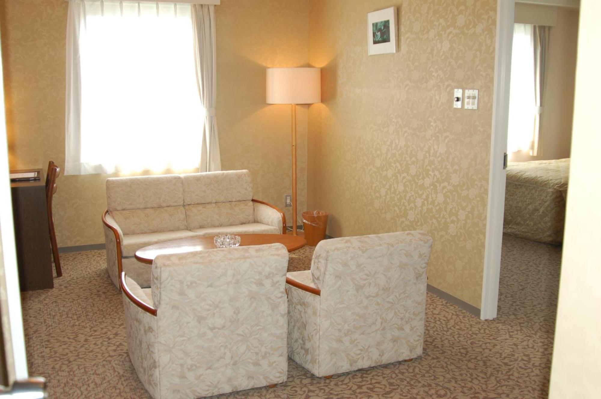 Shizunai Eclipse Hotel Синхидака Номер фото